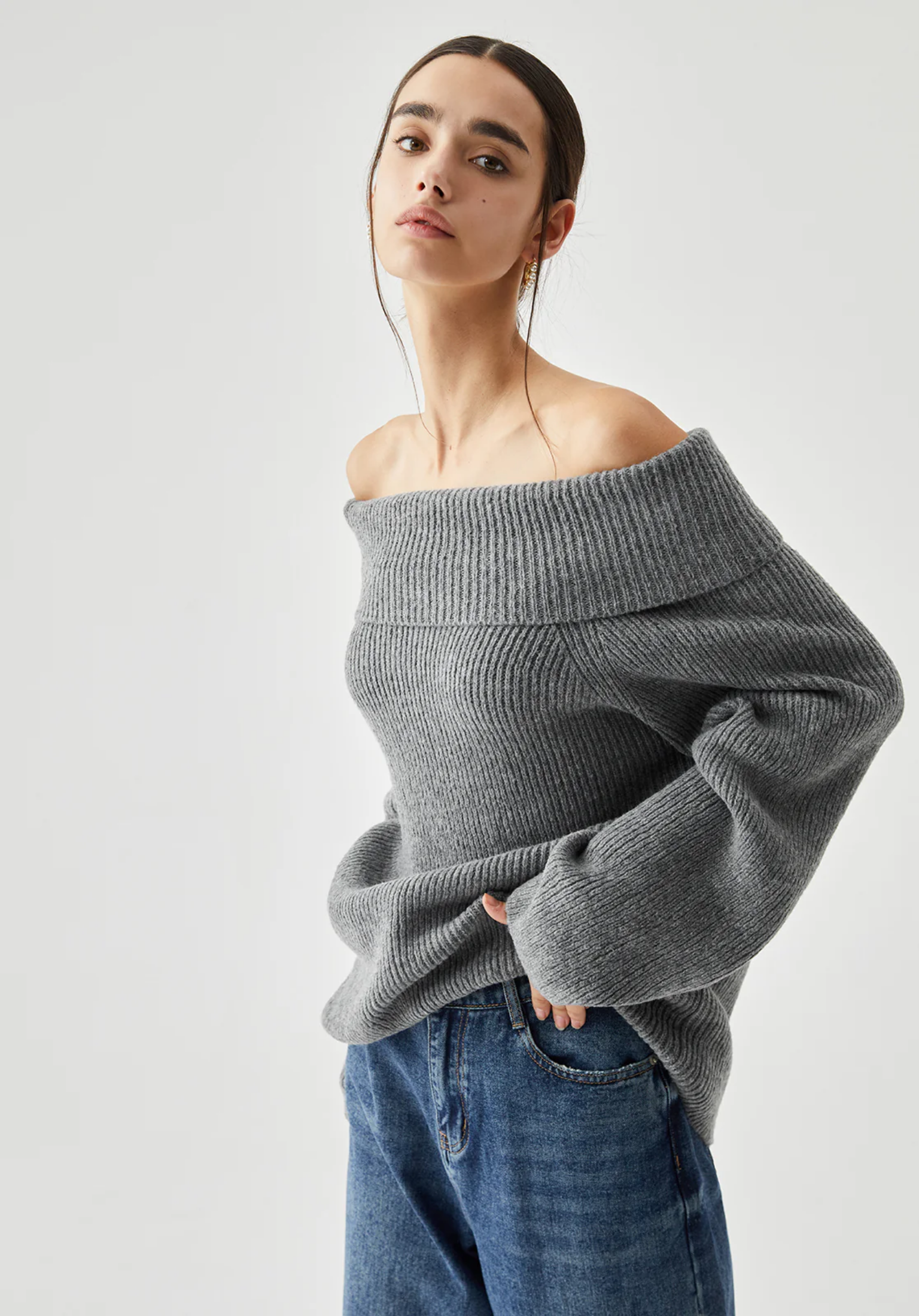 Gebreide off-shoulder trui